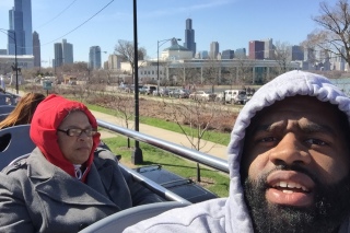 Ms. Pam and Terrell Rivers on a tour bus of Chicago.jpg
